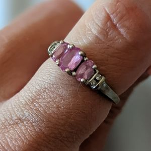 Pink sapphire and diamond ring
